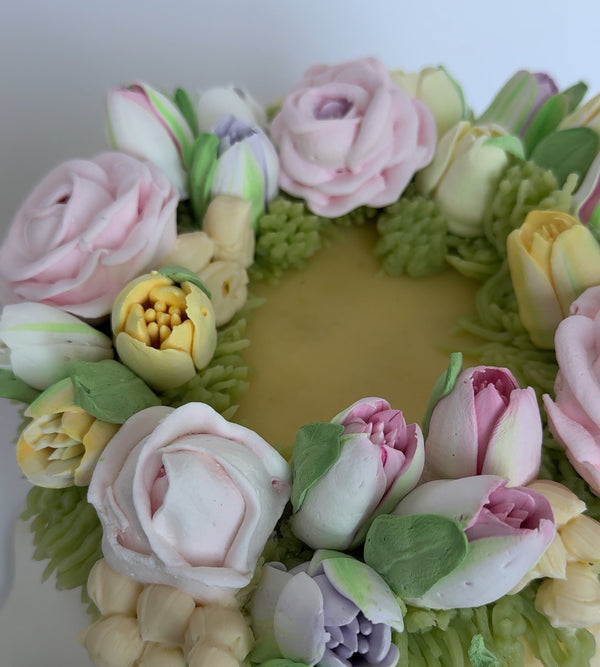 Marshmallow flower bouquet cake with pastel tones — looks like fresh blooms, tastes even better.