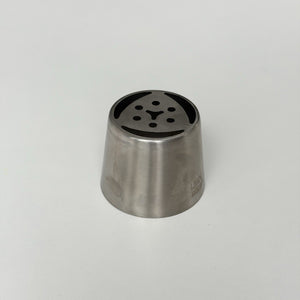 metallic kitchen tool with black interior on a light gray background