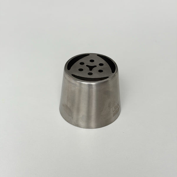 metallic kitchen tool with black interior on a light gray background
