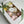 Load image into Gallery viewer, box with cupcakes, decorated with handmade marshmallow tulips, peonies and a green ribbon
