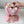 Load image into Gallery viewer, Bouquet of marshmallow tulip flowers wrapped in pink paper with a hand adjusting the flowers, on a light background.
