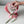 Load image into Gallery viewer, Handmade edible marshmallow tulip bouquet in pink wrapping with a gloved hand adjusting one flower

