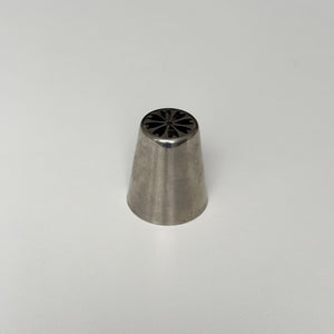 metallic icing tip on a white background