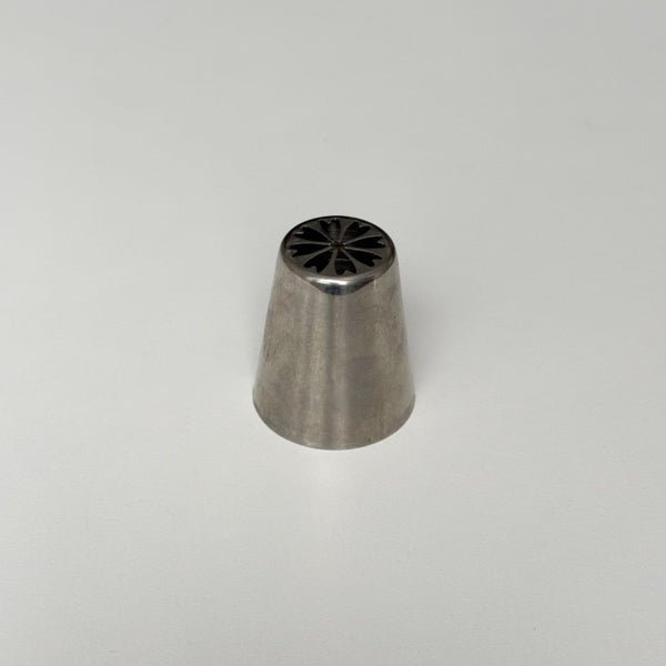 metallic icing tip on a white background