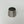 Load image into Gallery viewer, metallic cone-shaped object with a textured top on a light gray background
