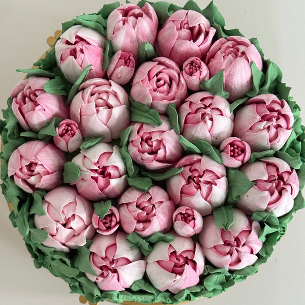 handmade pink marshmallow tulip cake viewed from above