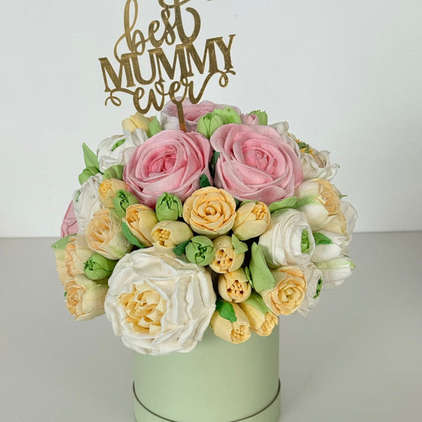 marshmallow flower bouquet with pink and cream roses in a box and a best mummy ever topper