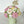 Load image into Gallery viewer, handmade marshmallow flower bouquet cake with pink, white and yellow flowers in a pastel green box topped with a gold “best mummy ever” cake topper
