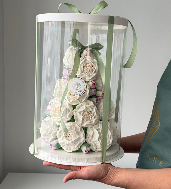 sweet Christmas tree decorated with marshmallow in gift box with green lace